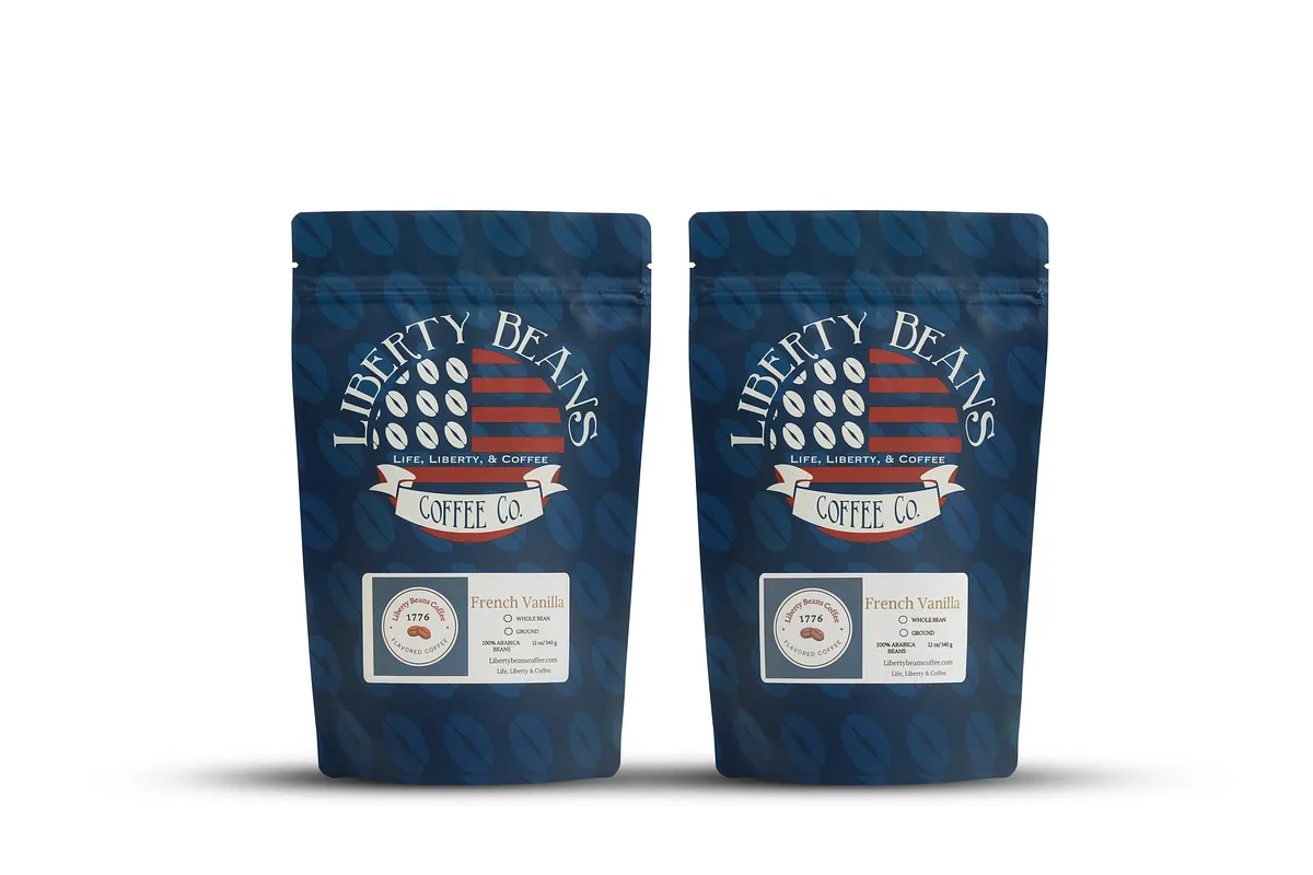 Two Liberty Beans Coffee Co. French Vanilla coffee bags on a white background