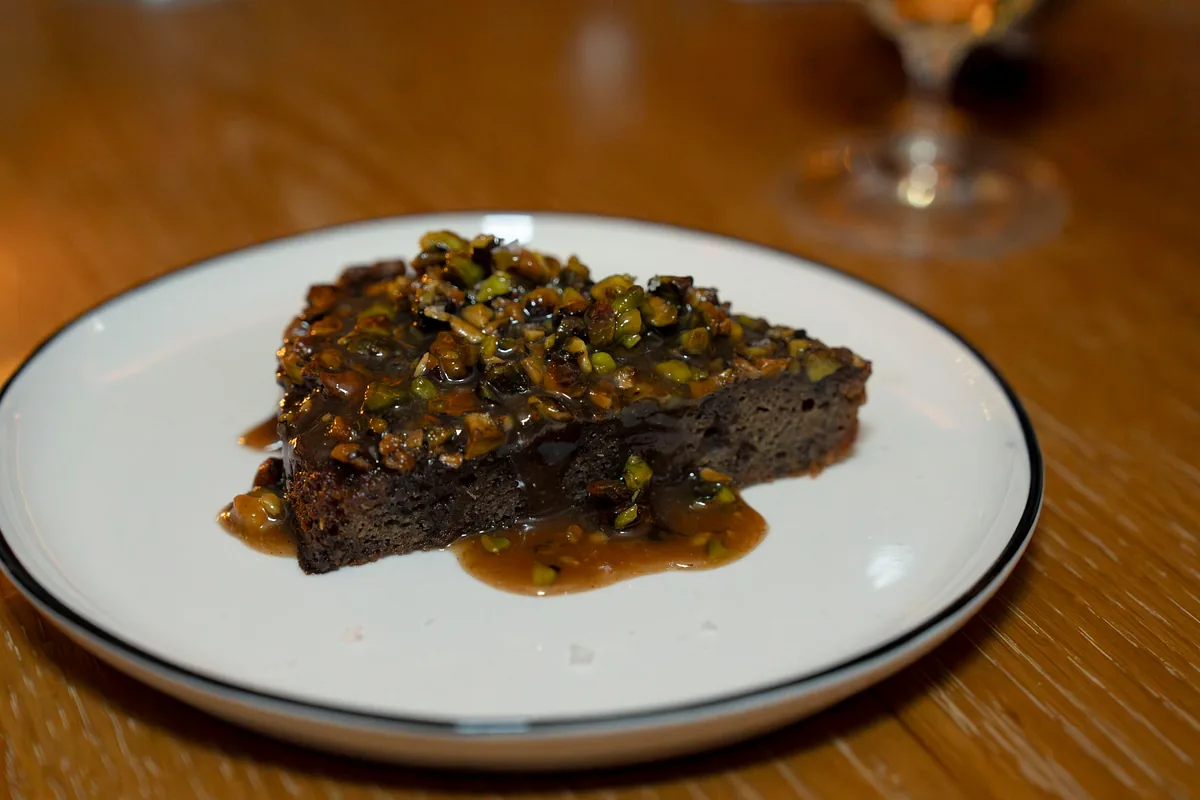 Steak finished with a herb and pistachio relish