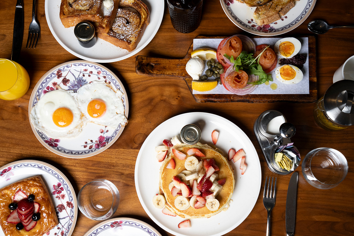 Overhead hospitality photograph of a breakfast spread
